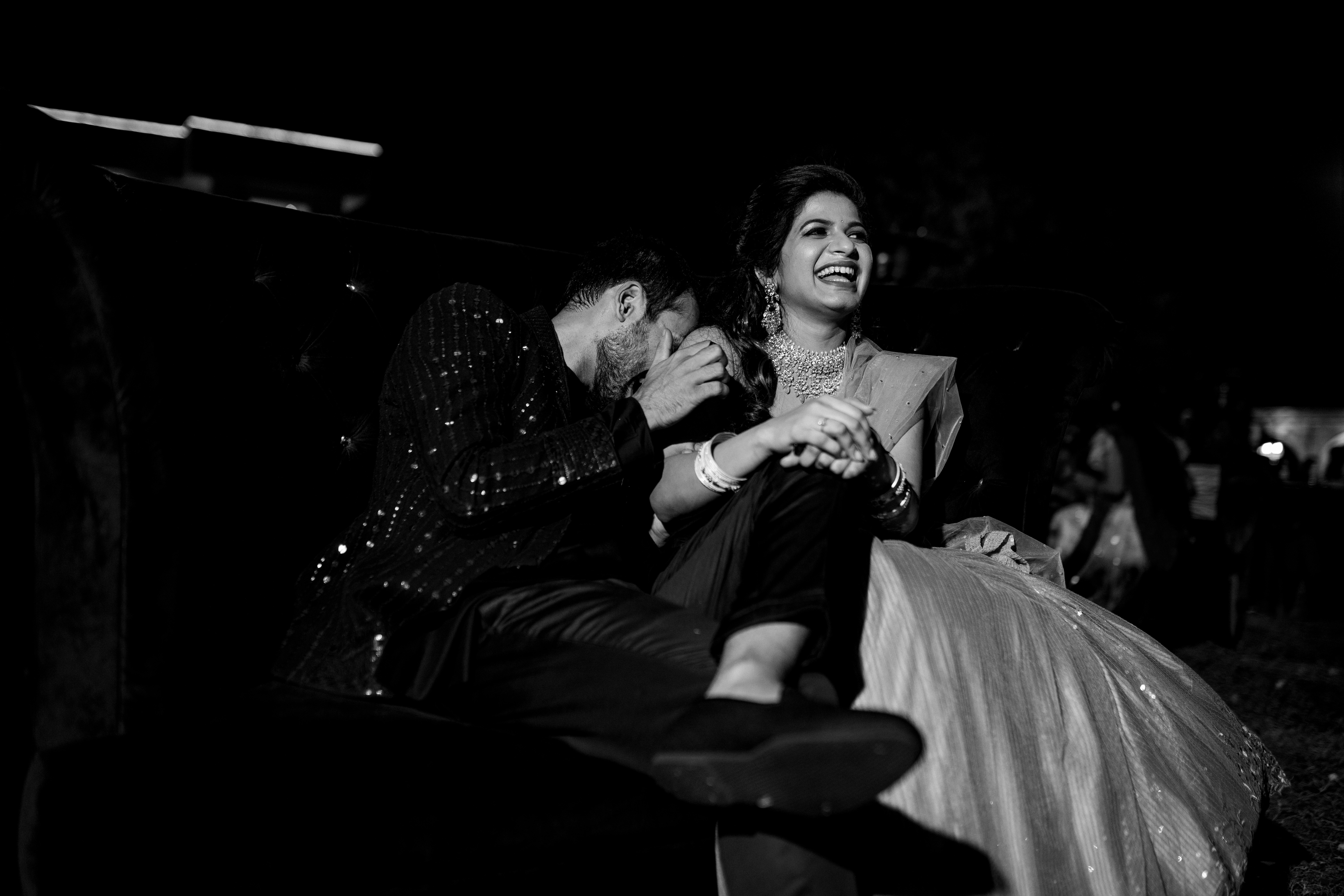 Mounika & Satya in a romantic black & white wedding photo, showcasing their love. Captured by Out of The Blues Fine Art Wedding Photography in Hyderabad.