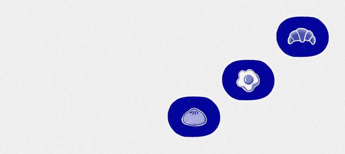 An orange cube-shaped side table is shown.