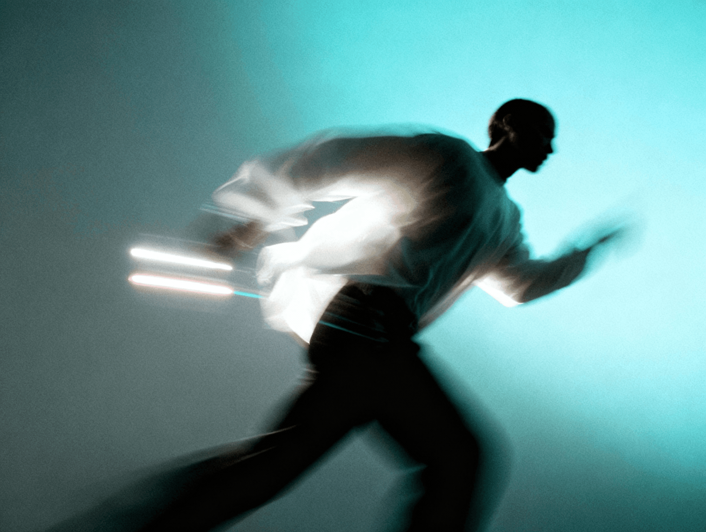 Motion blurred silhouette running on a cyan background scenerio