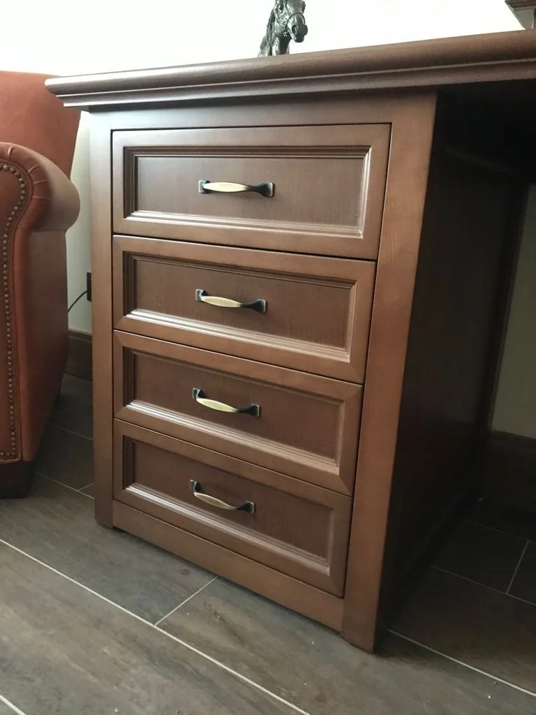 A vintage race car with blue, orange, and white livery