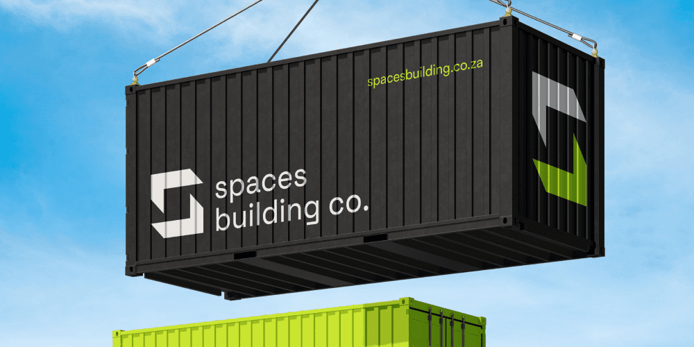 A container in the air with a logo on.