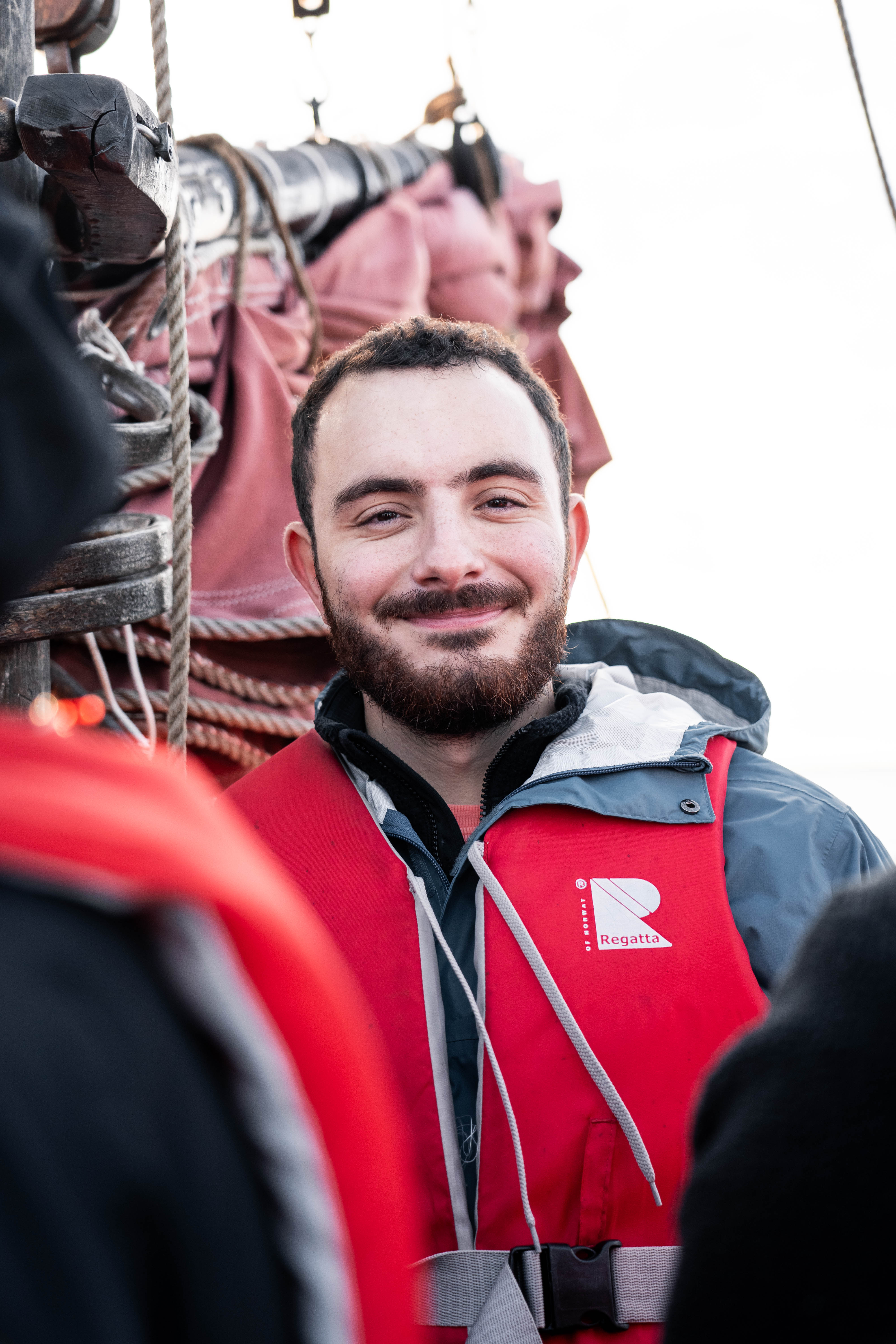 Portrait of a cheerful man on a sailing trip