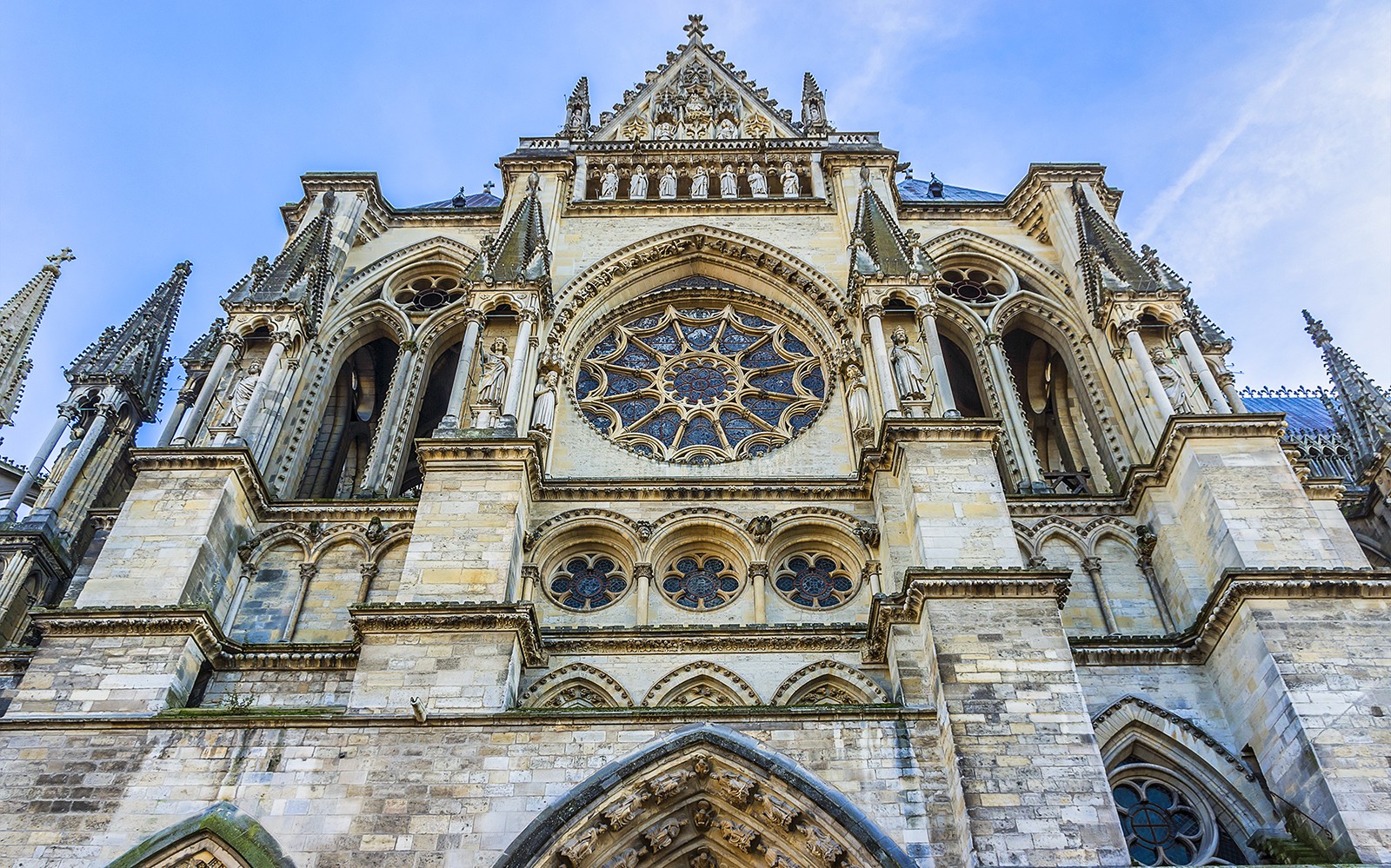 Facade of Reims Cathedral, a stop on the Champagne region day trip from Paris.