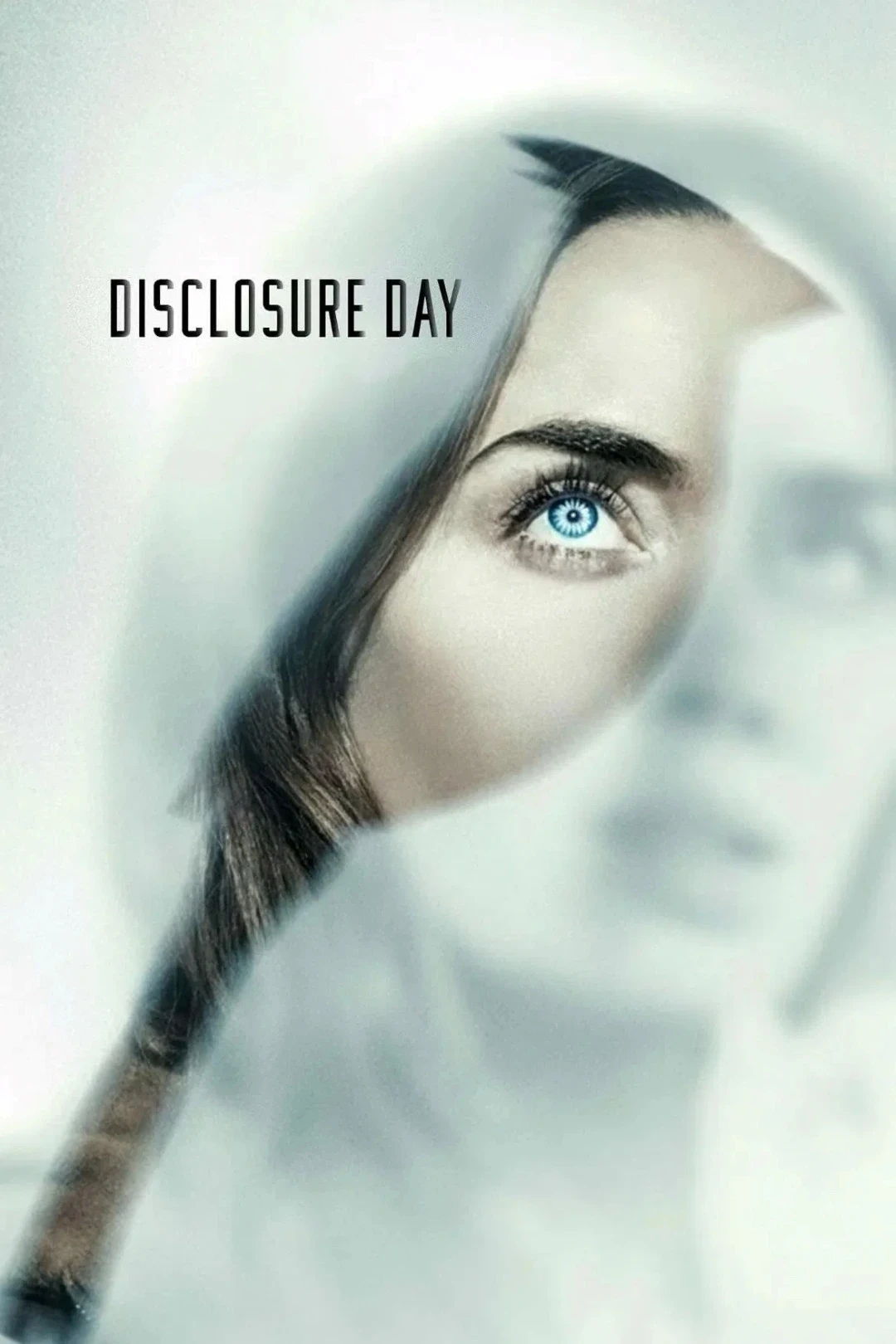 A dramatic movie poster with the words "Disclosure Day," featuring a close-up of a woman's face partially obscured by a foggy surface, emphasizing her intense gaze and mysterious expression.