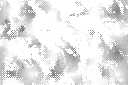 a black and white photo of clouds in the sky