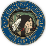 Official seal of Ball Ground, Georgia, featuring a Native American figure, lacrosse sticks, and the year 1883.