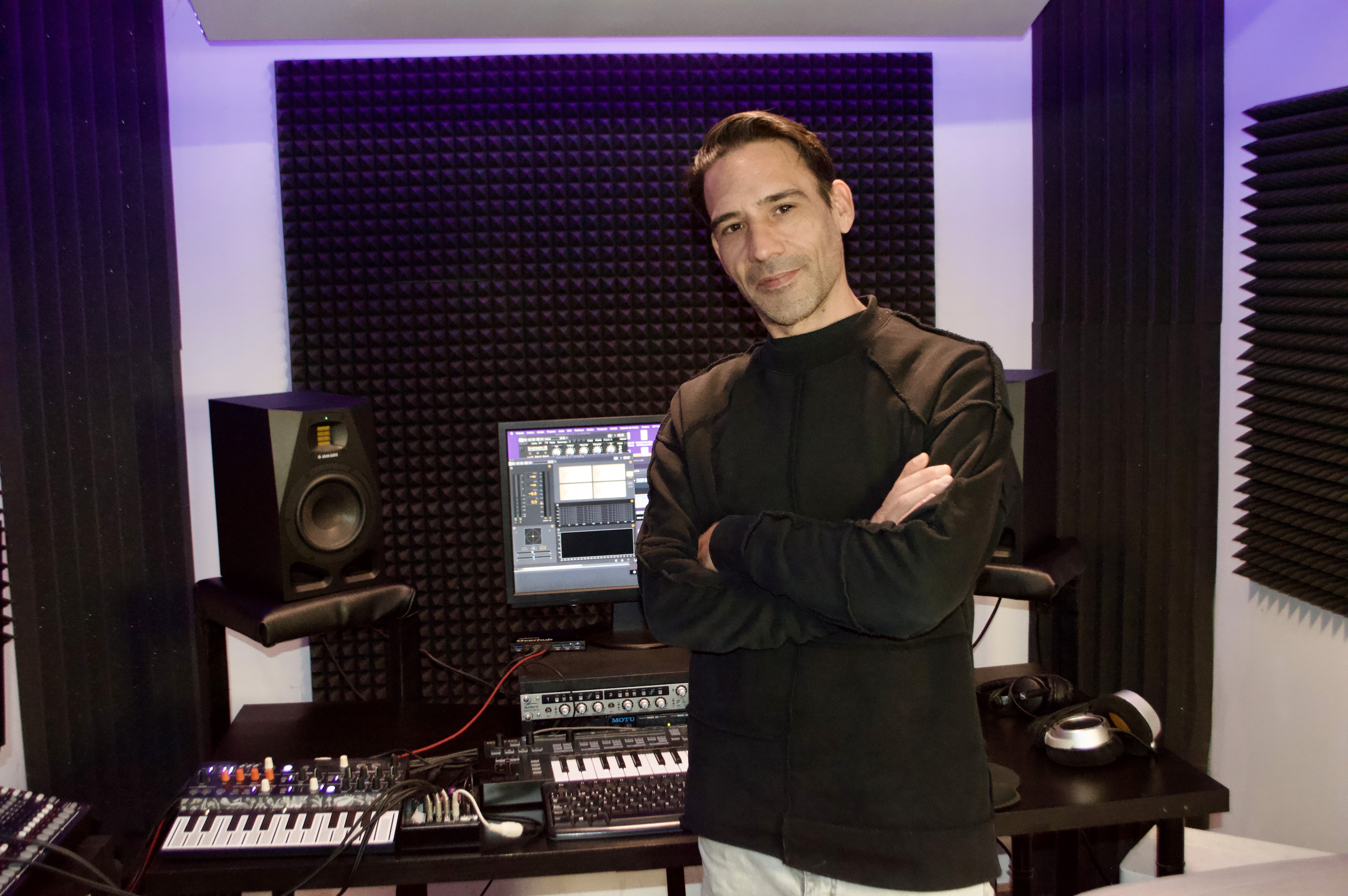 Music Producer sitting at his desk