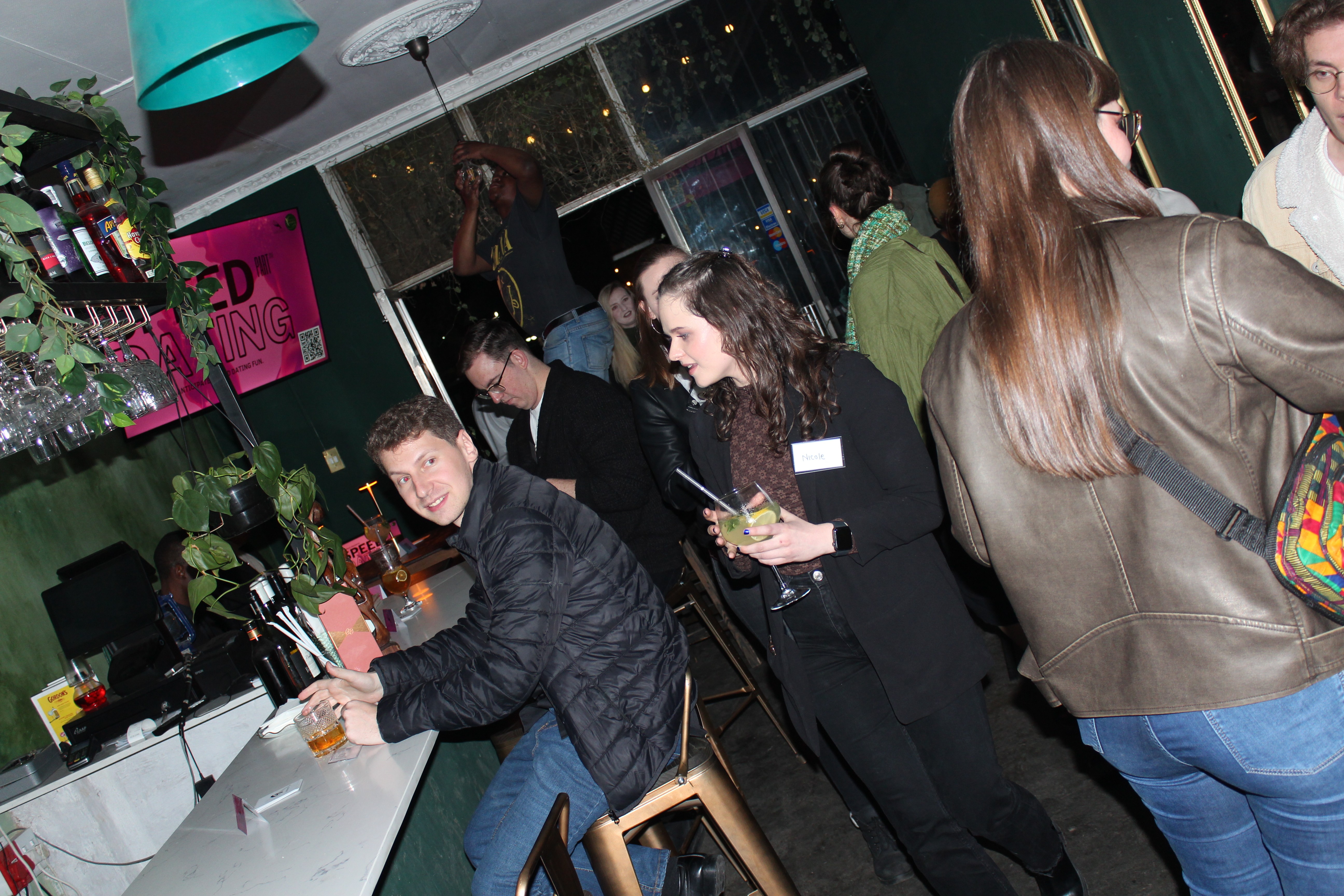 A group of people at a bar