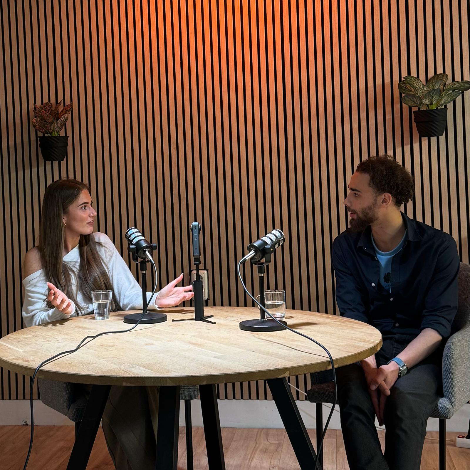 A man standing with Sufboard