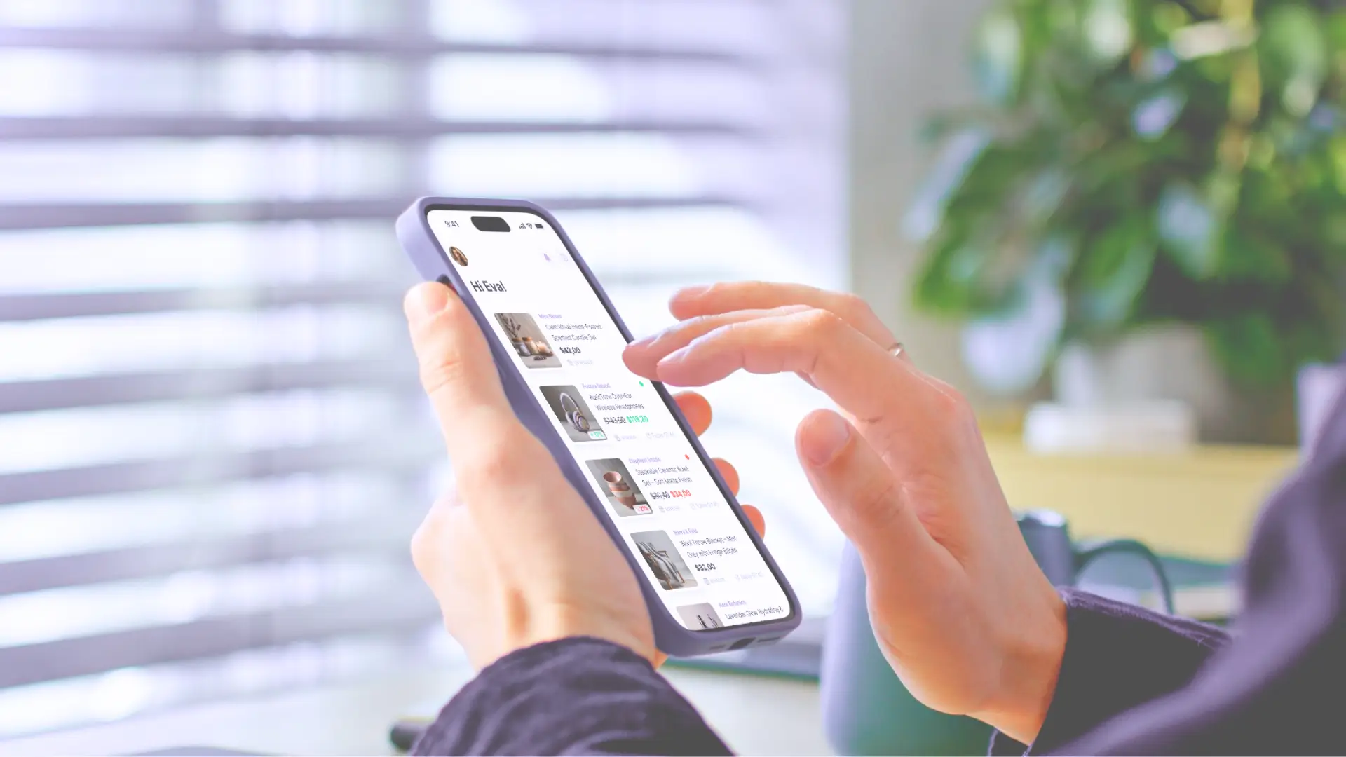 Person using the Whisprice app on an iPhone to track product prices with a clean, shopping-like interface.