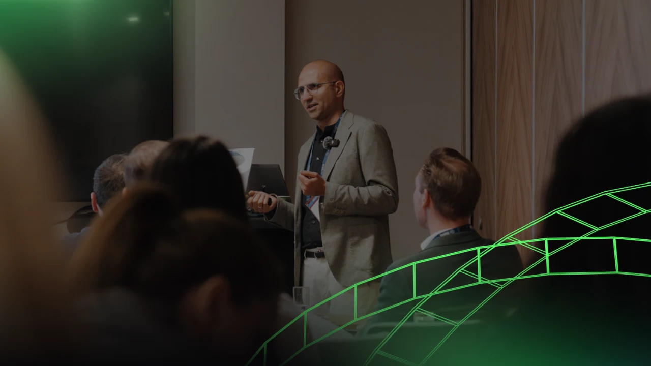 Ernesto presenting at a conference 
