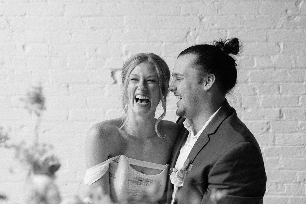 Bride and groom laughing for wedding portrait black and white photography Nashville Tennessee.
