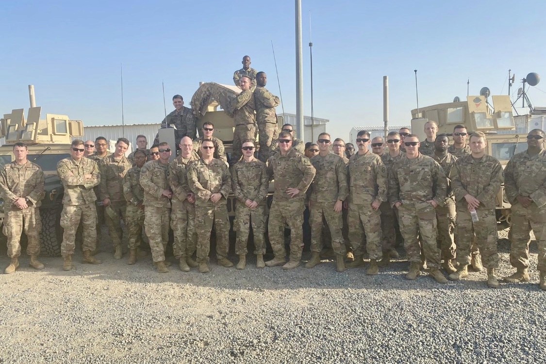people sitting on chair in front of laptop computers