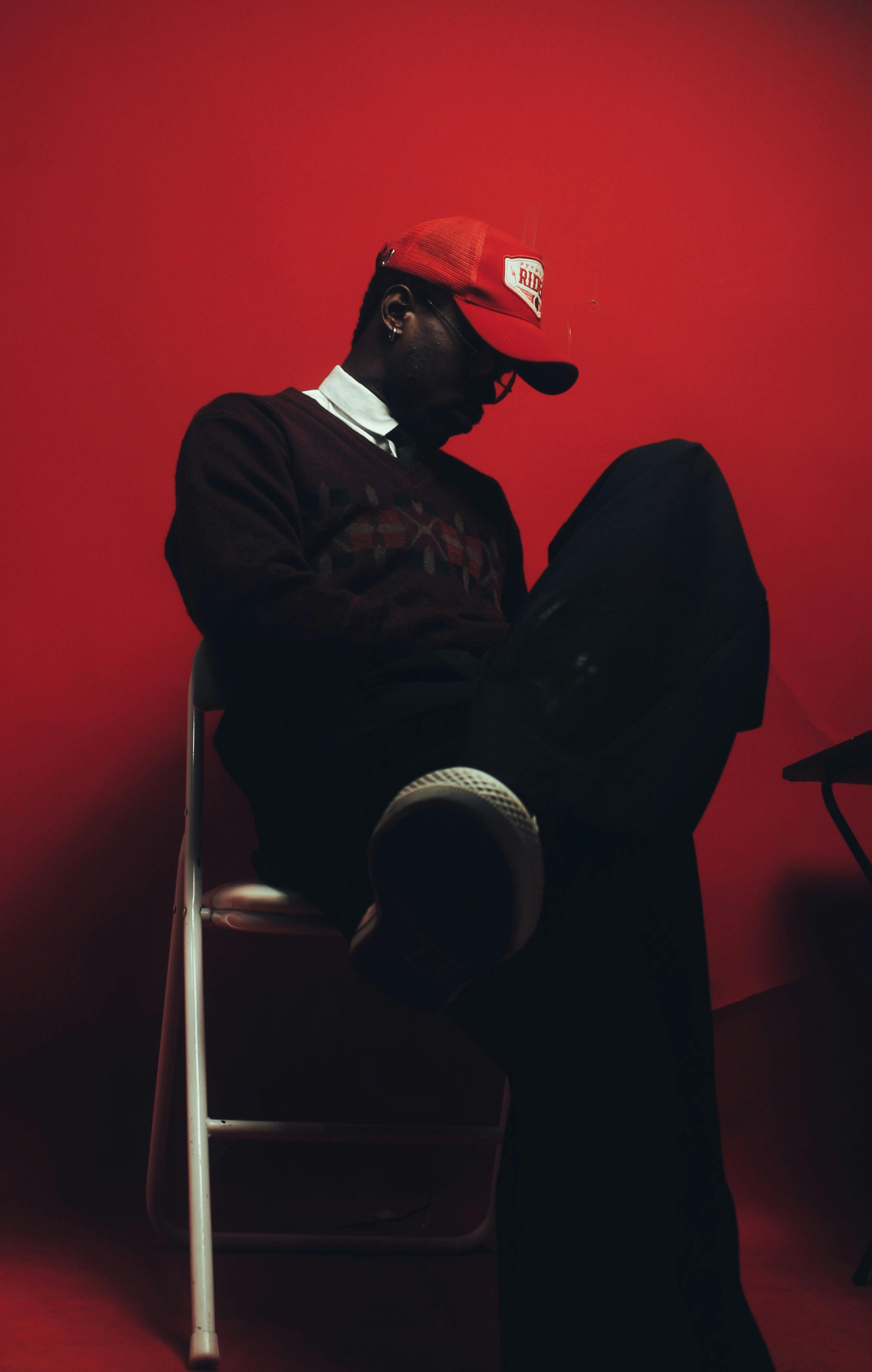 a woman holding her hands up to her face