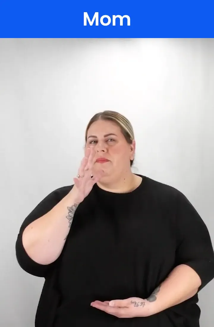 A Deaf signer signs MOM in ASL