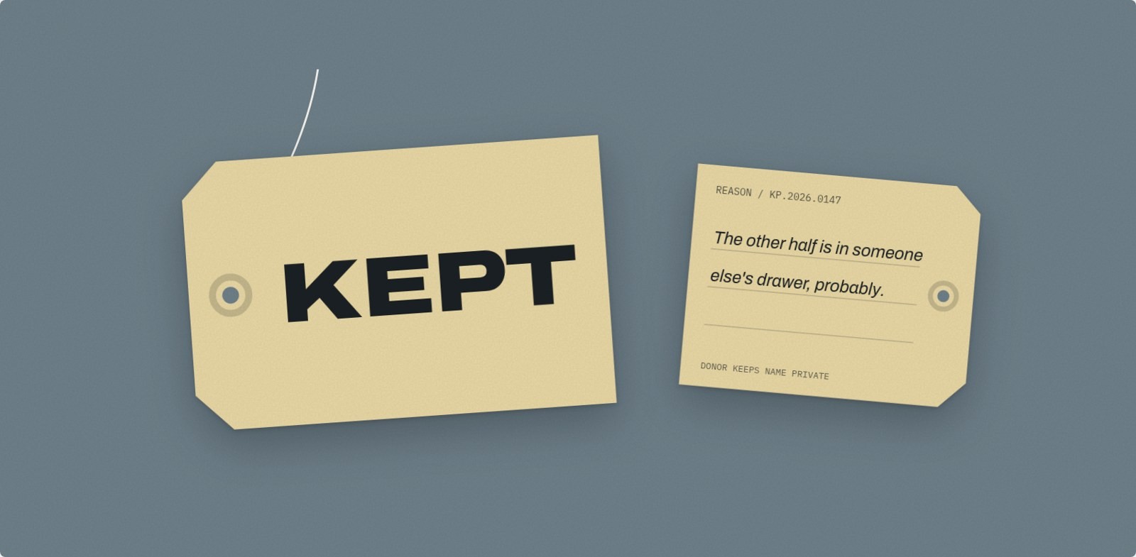 The KEPT tag mark shown large, front and reverse.