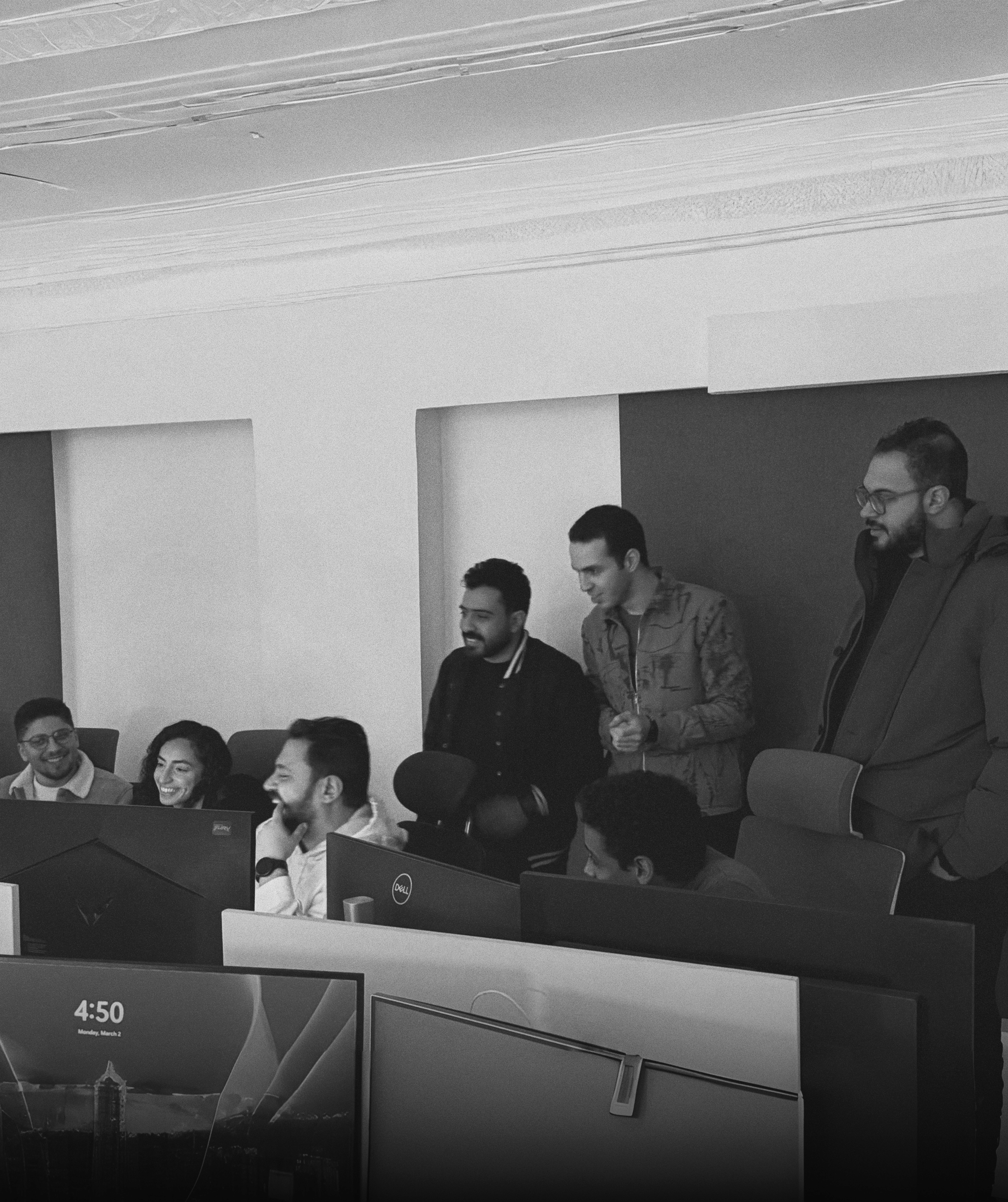 Interior of a cafe or workspace with several people at tables