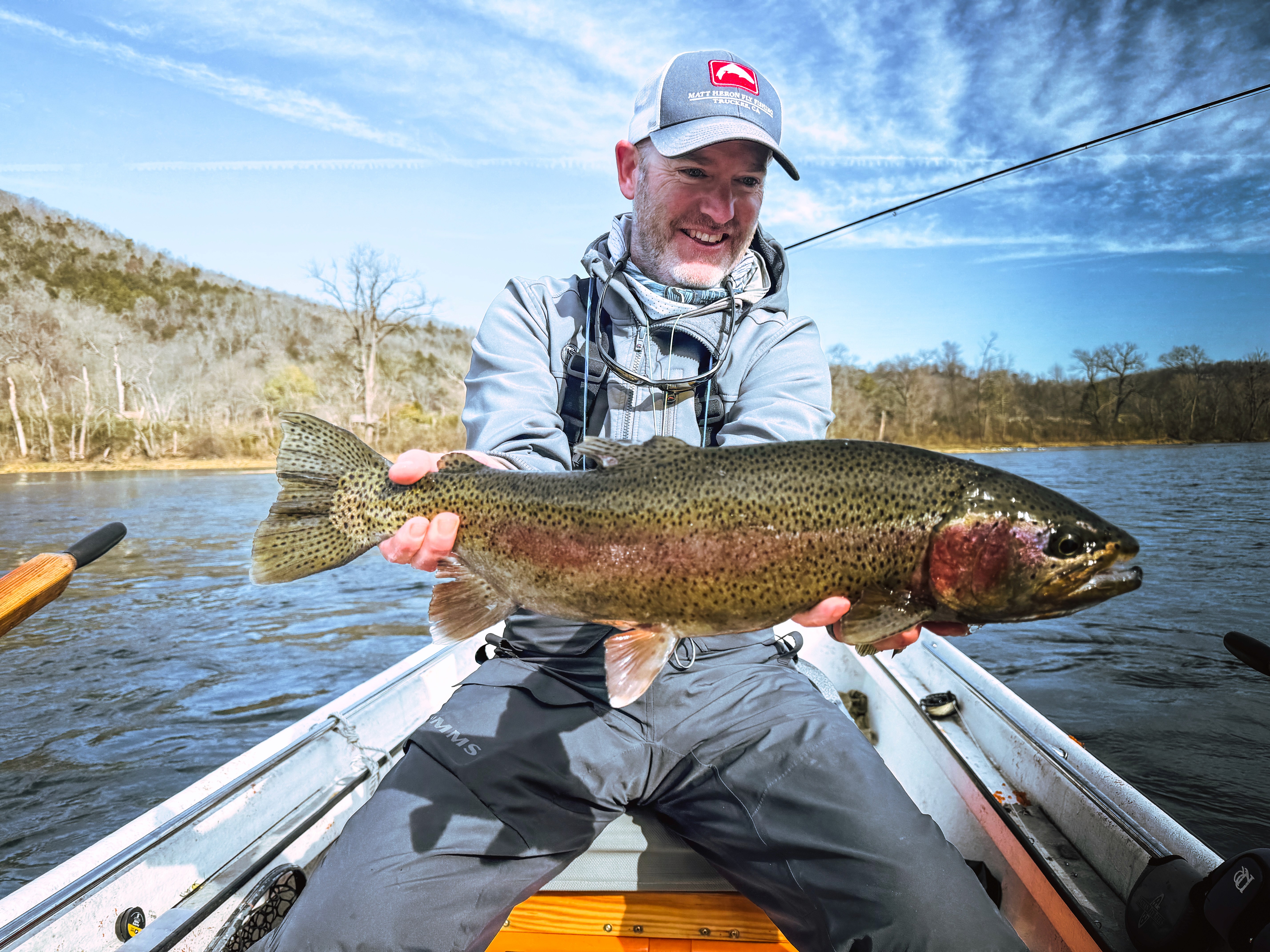 a woman holding an apple