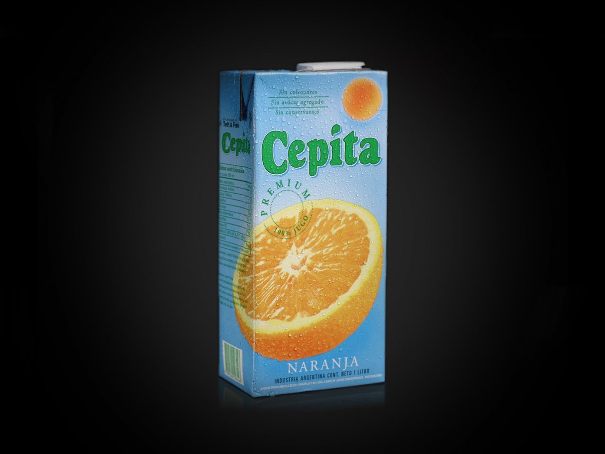 Rustic cabin in a golden field at sunset