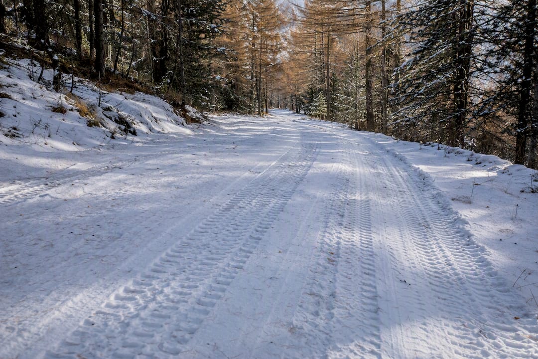 Tyre tracks on a snow-covered winter road