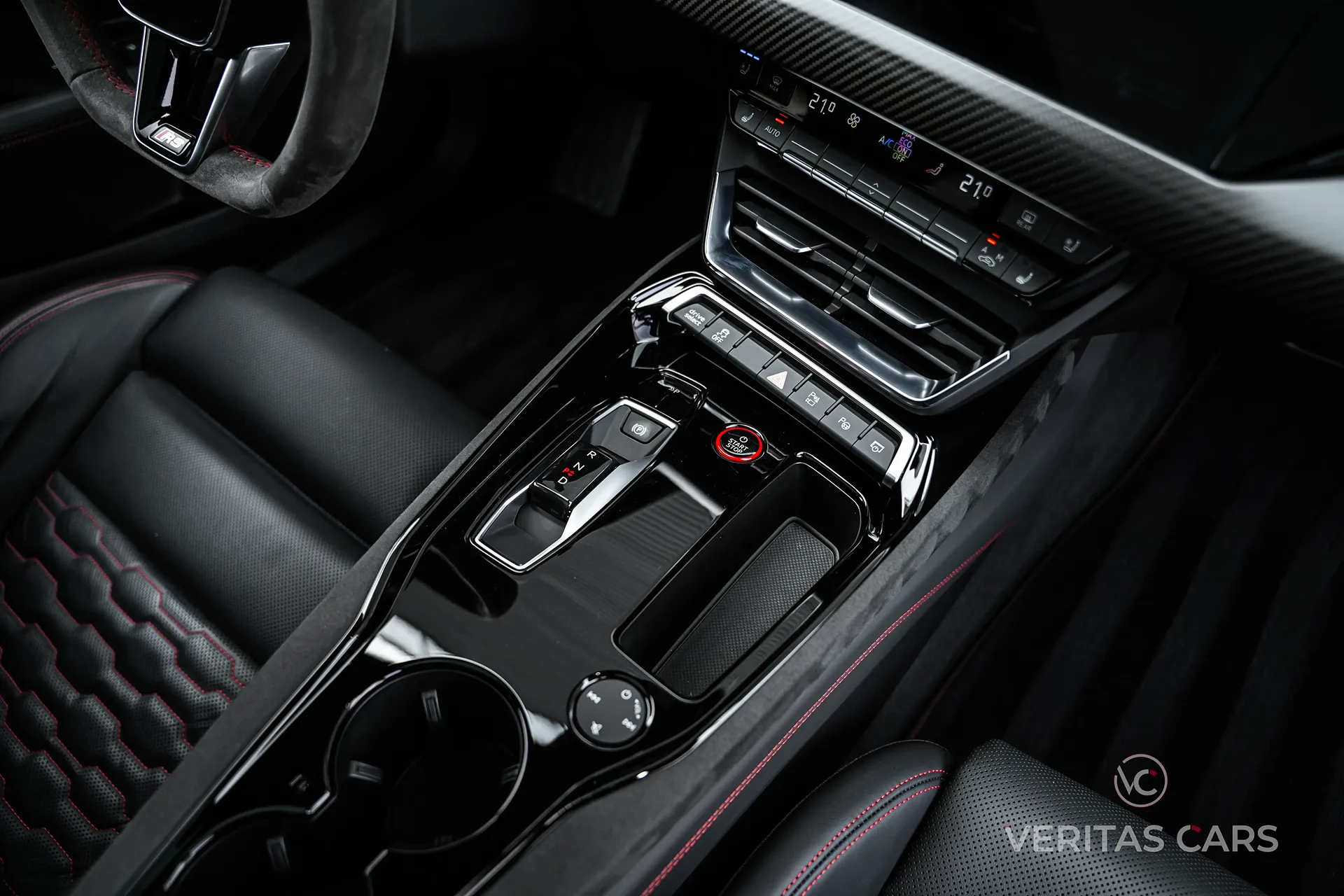 Interieur image of an Audi, showing radio and gear shifter