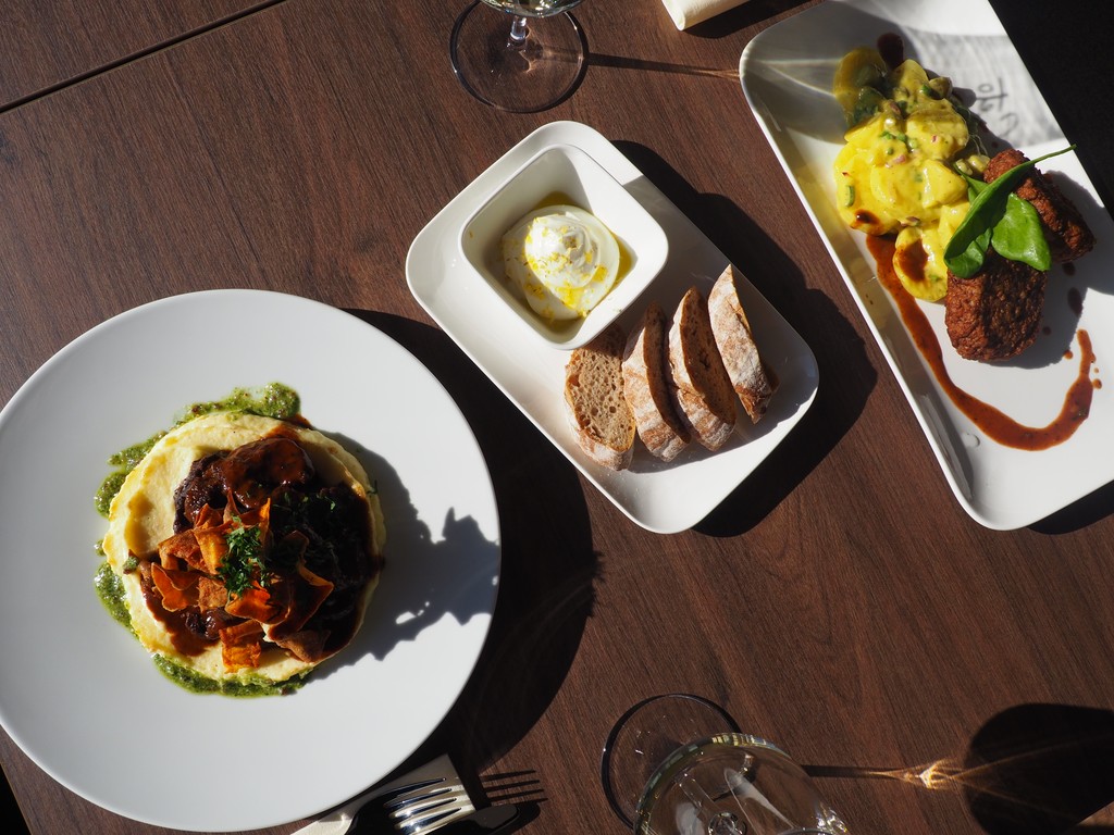 a vanilla ice cream with matcha cream served in a white plate
