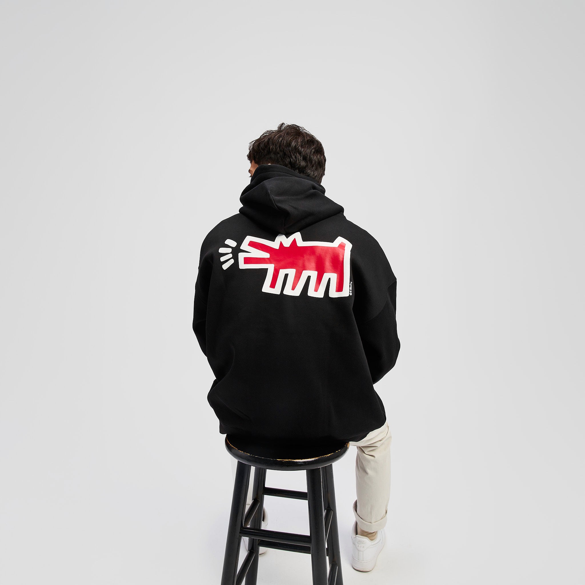 American flag flying against a cloudy sky