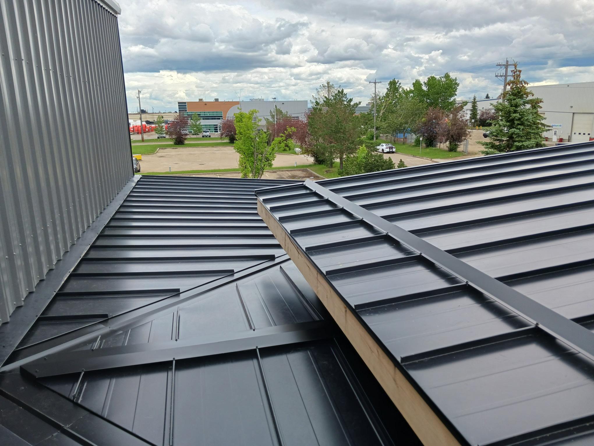 Close-up of architectural shingles and ridge vent