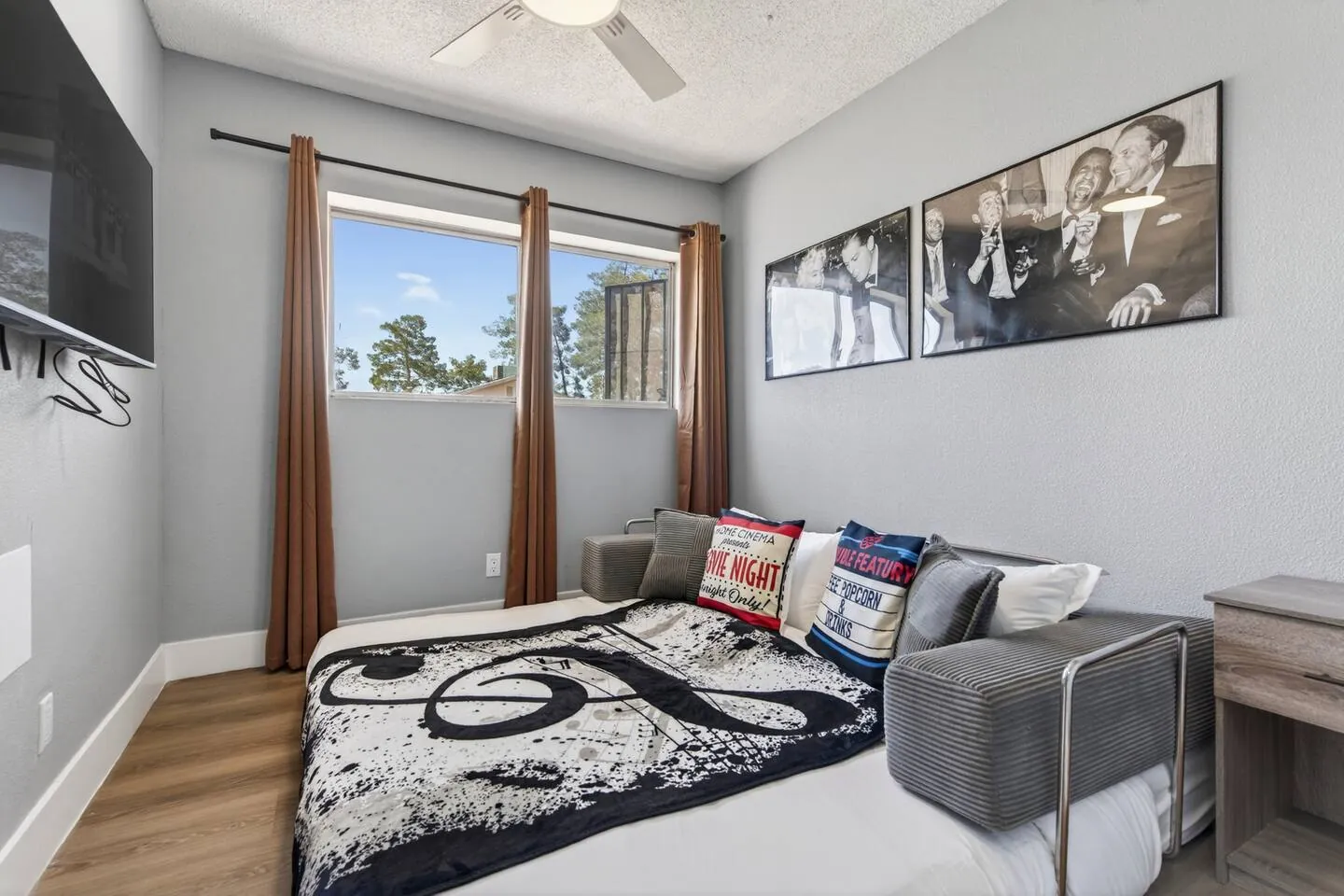 Lounge with a sofa bed and movie-star prints, Retro Vegas in North Las Vegas