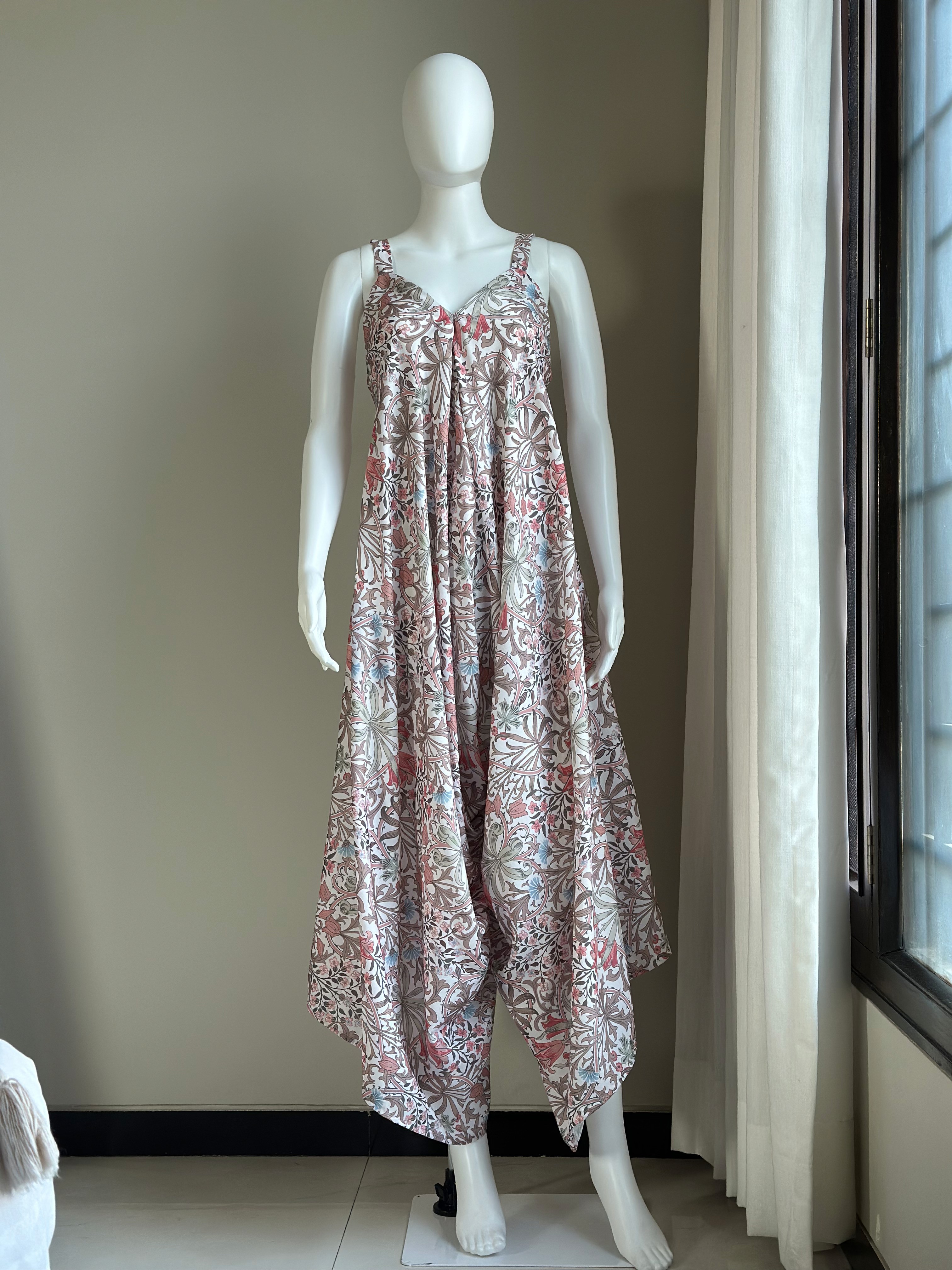Light garment on a white mannequin — no contrast, edges get lost.