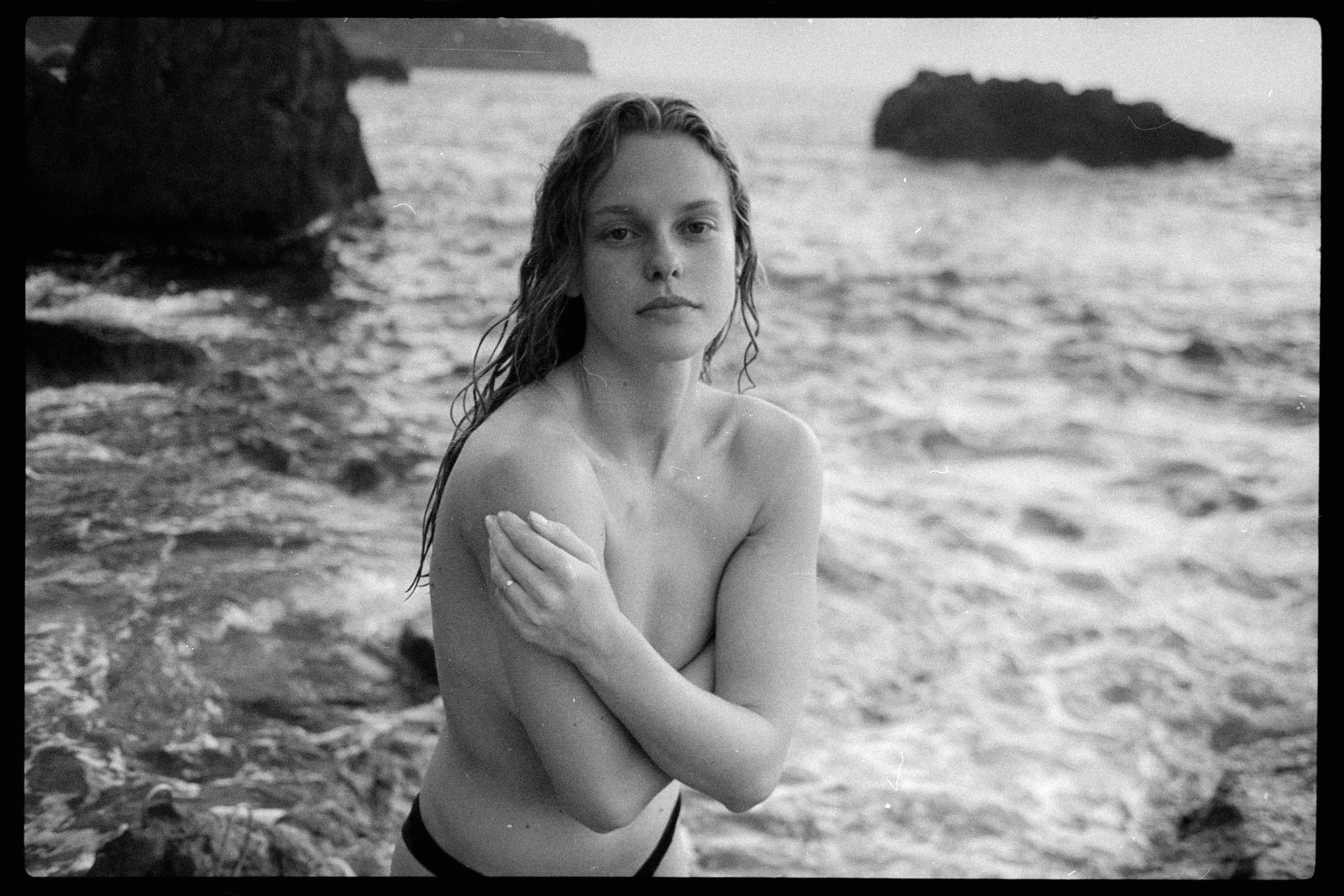 Streetside billboard with flyposters of the Batch.Works brand and illustrations