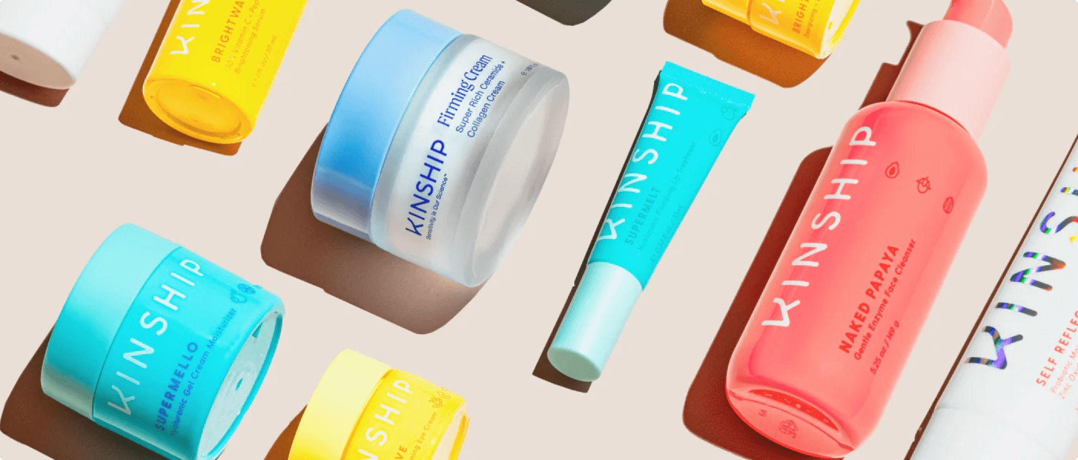 Hero image featuring Kinship skincare products with bright packaging and clean ingredient-focused styling