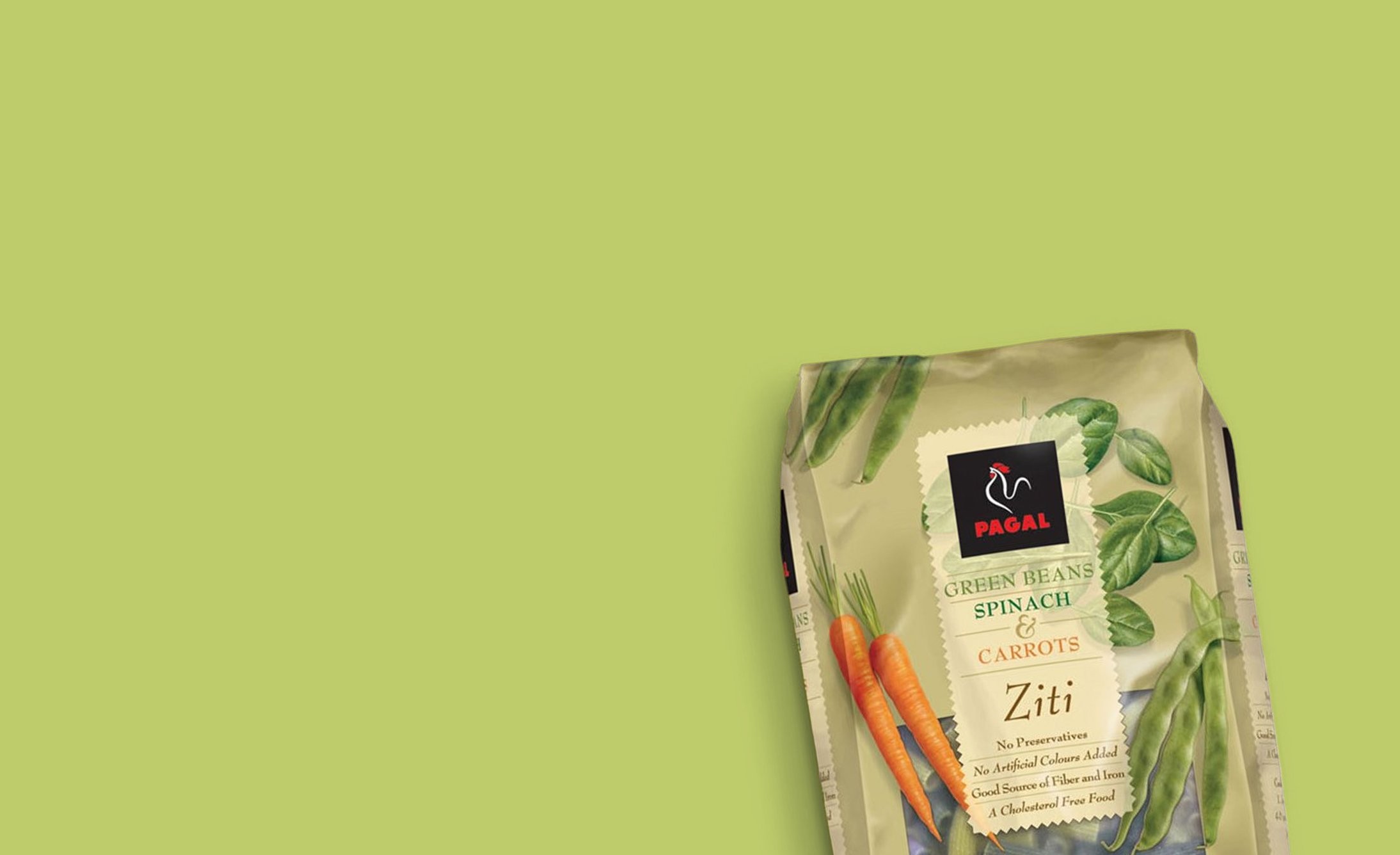 Packet of "Pagal" brand Ziti pasta with green beans, spinach, and carrots. The packaging is colorful with vegetable images on a light green background.