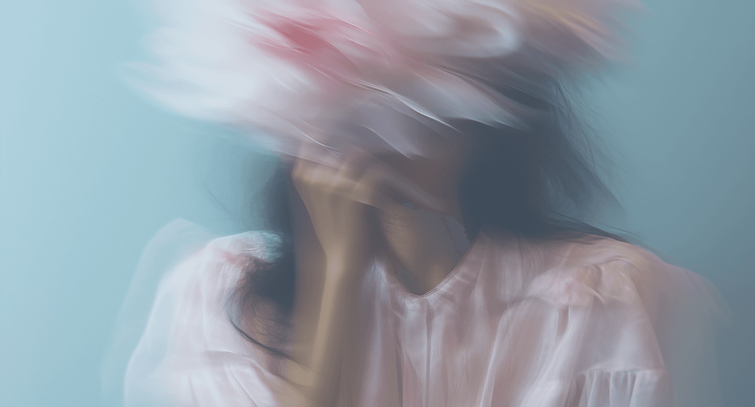 A woman wearing a pink hat that obscures her face, creating an air of mystery and intrigue.