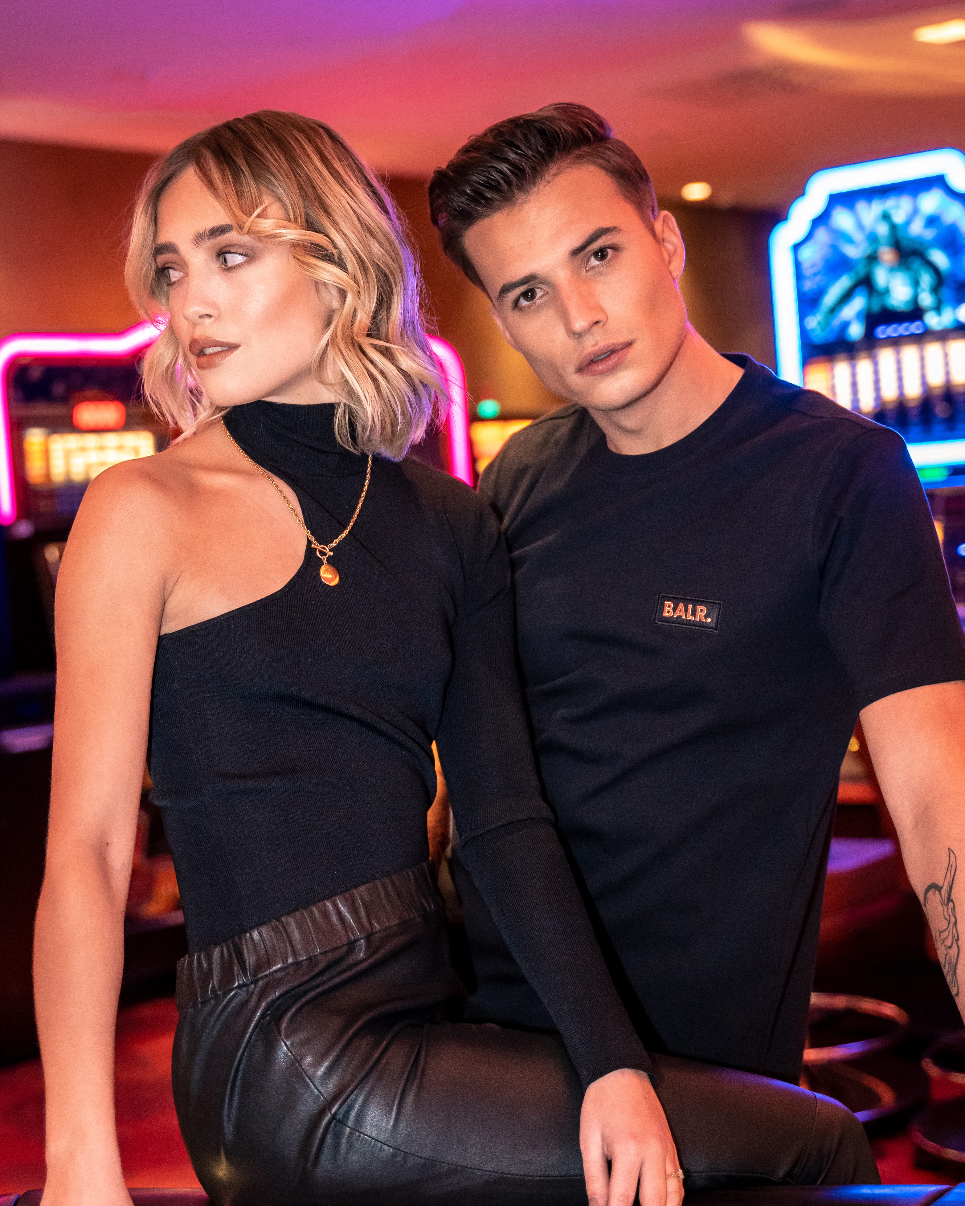 Streetside billboard with flyposters of the Batch.Works brand and illustrations