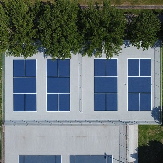 Completed pickleball court with vibrant surface design