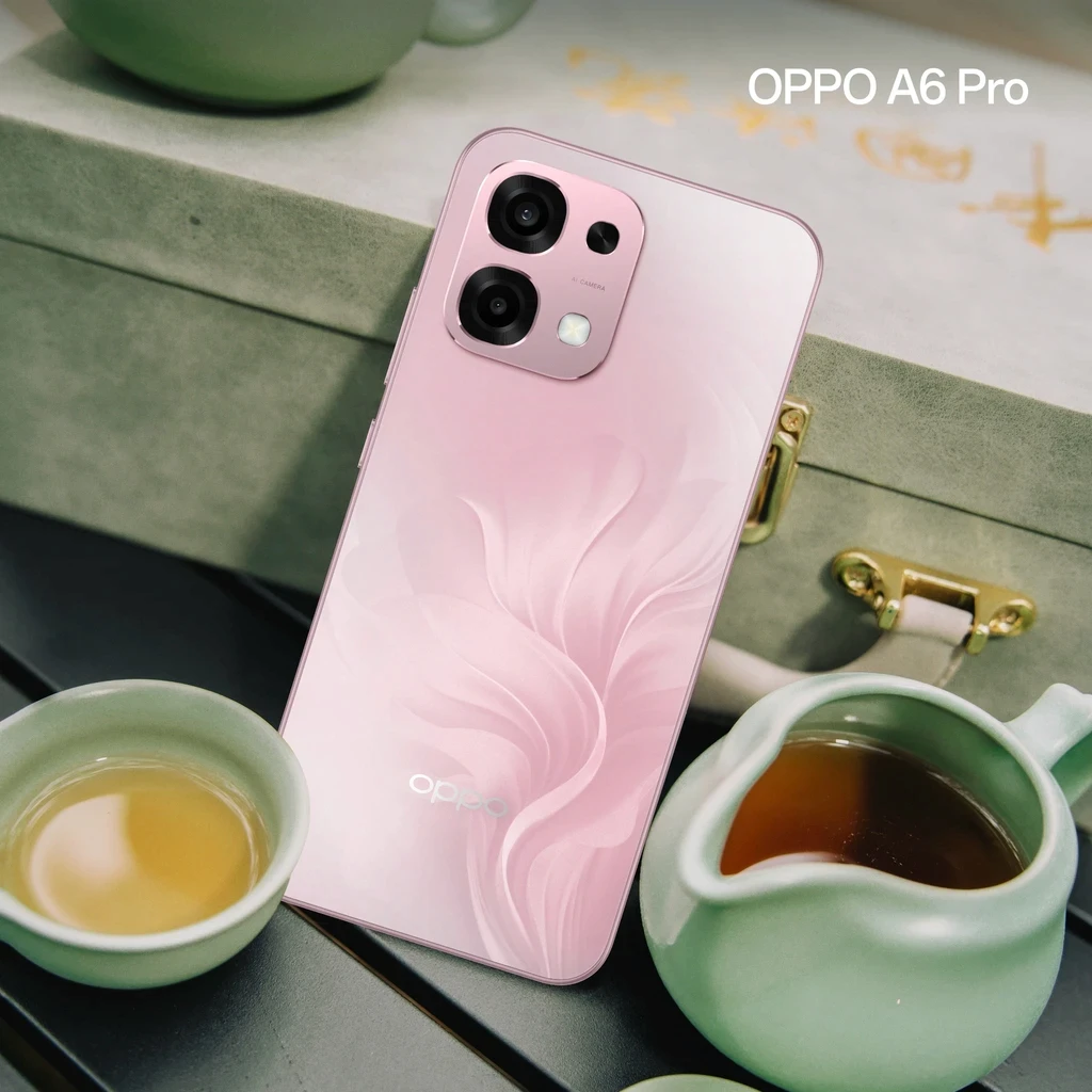 Espresso pouring into iced coffee with Orbit branding in a modern café setting
