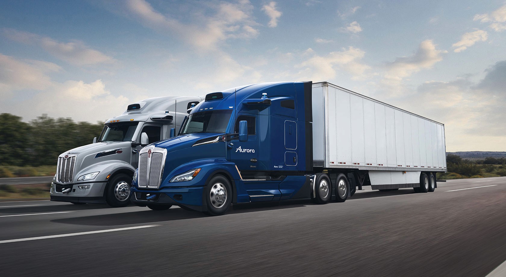 Aurora autonomous truck on a highway, illustrating the future of driverless freight operations