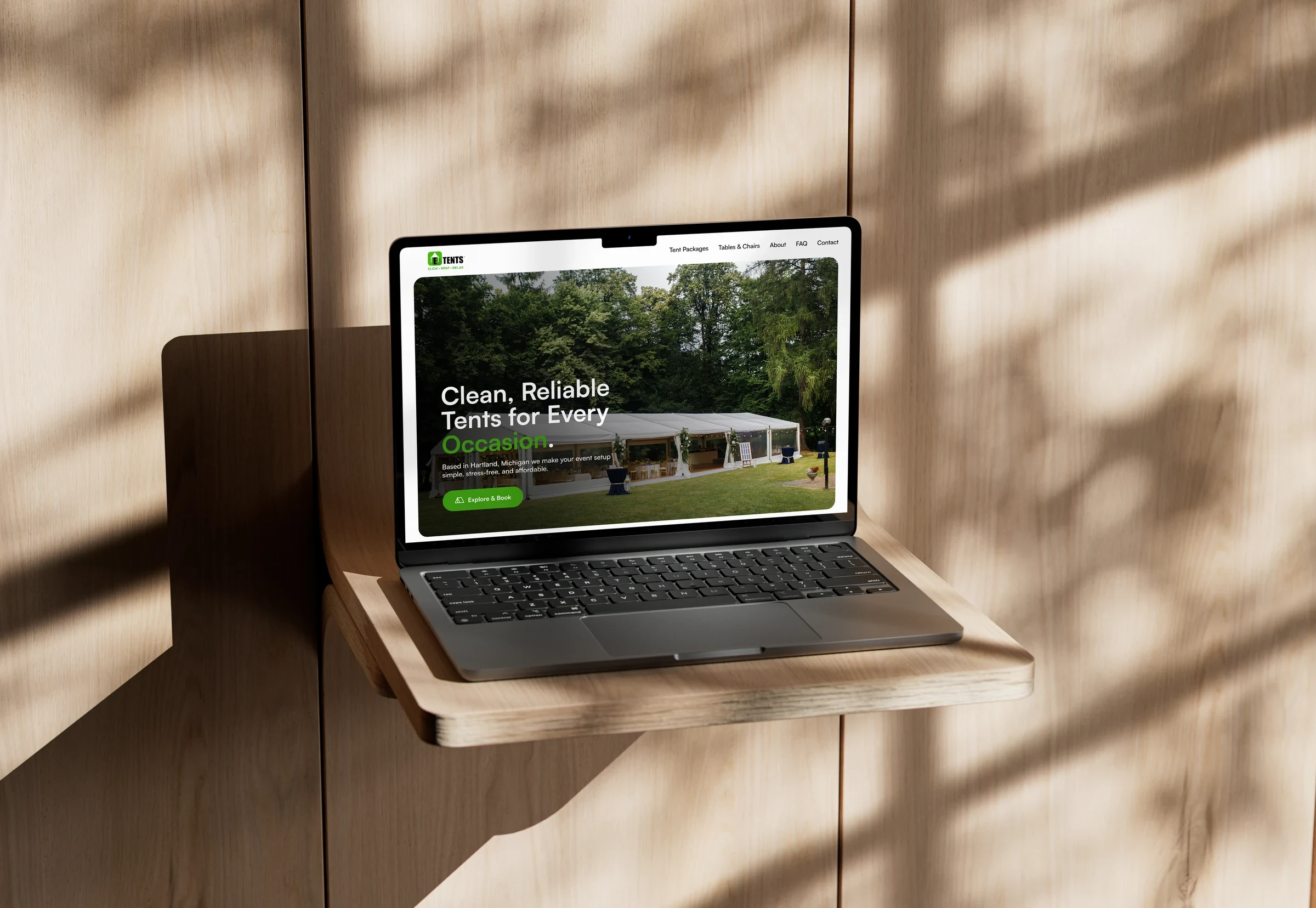 E TENTS website on a laptop mockup