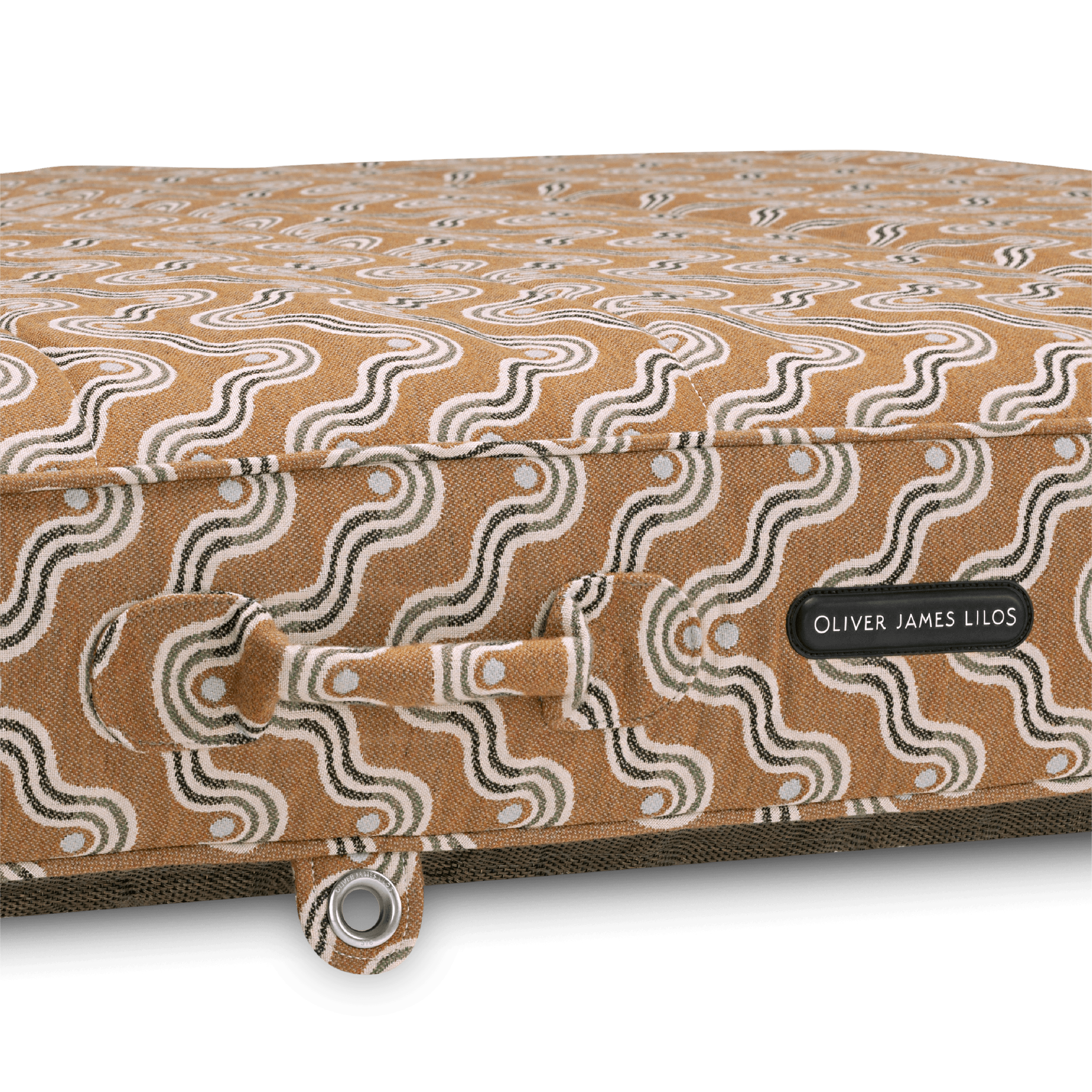 Close-up of pool float showing brown block-print-inspired handle, earthy weave texture, and stainless eyelet