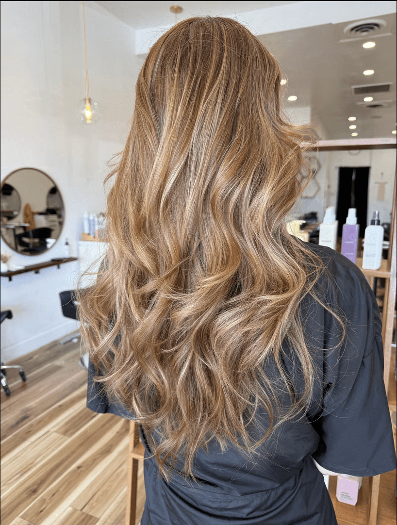 Warm dimensional blonde color melt by Lauren Jojola at Del Sol Hair Studio Huntington