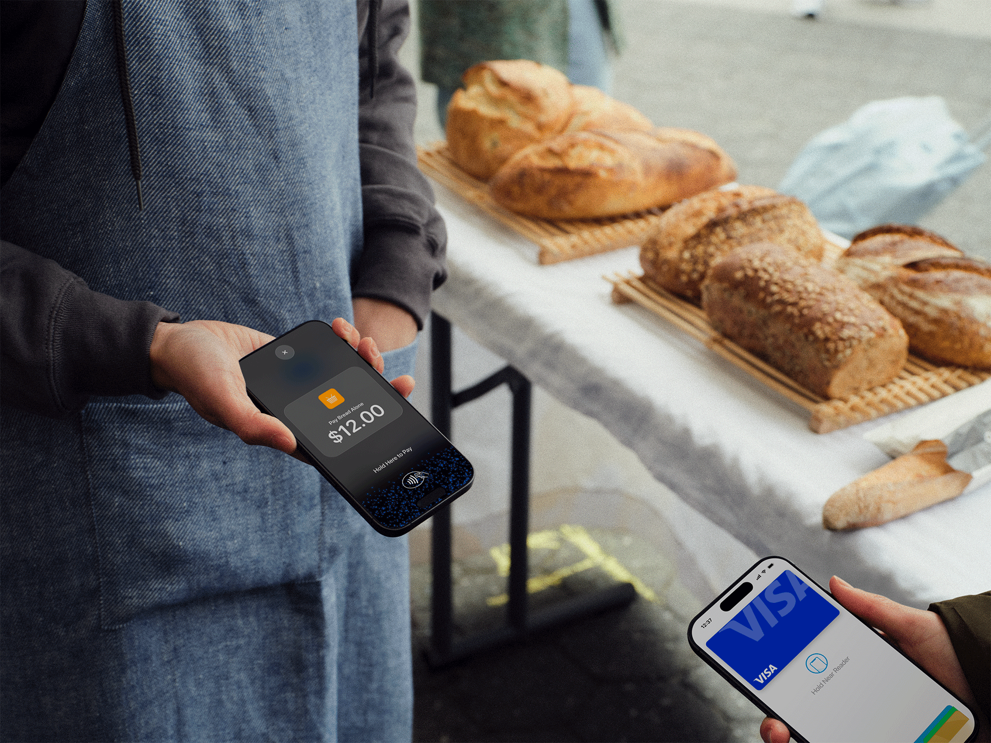 Hand silhouette holding a smartphone with a glowing red screen.