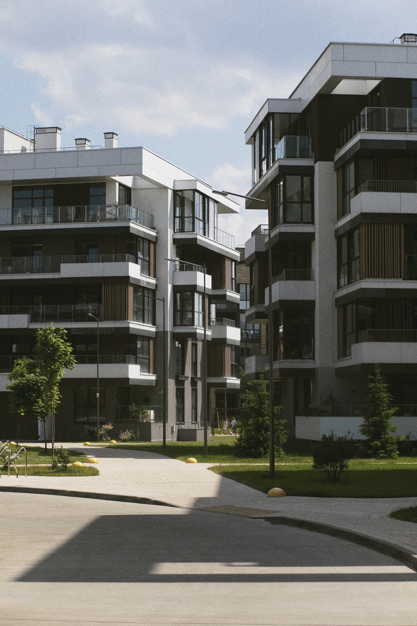 Living room of a very modern house with plants and brown furniture