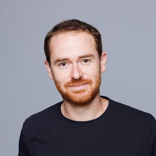 A headshot of Greg Bergé
