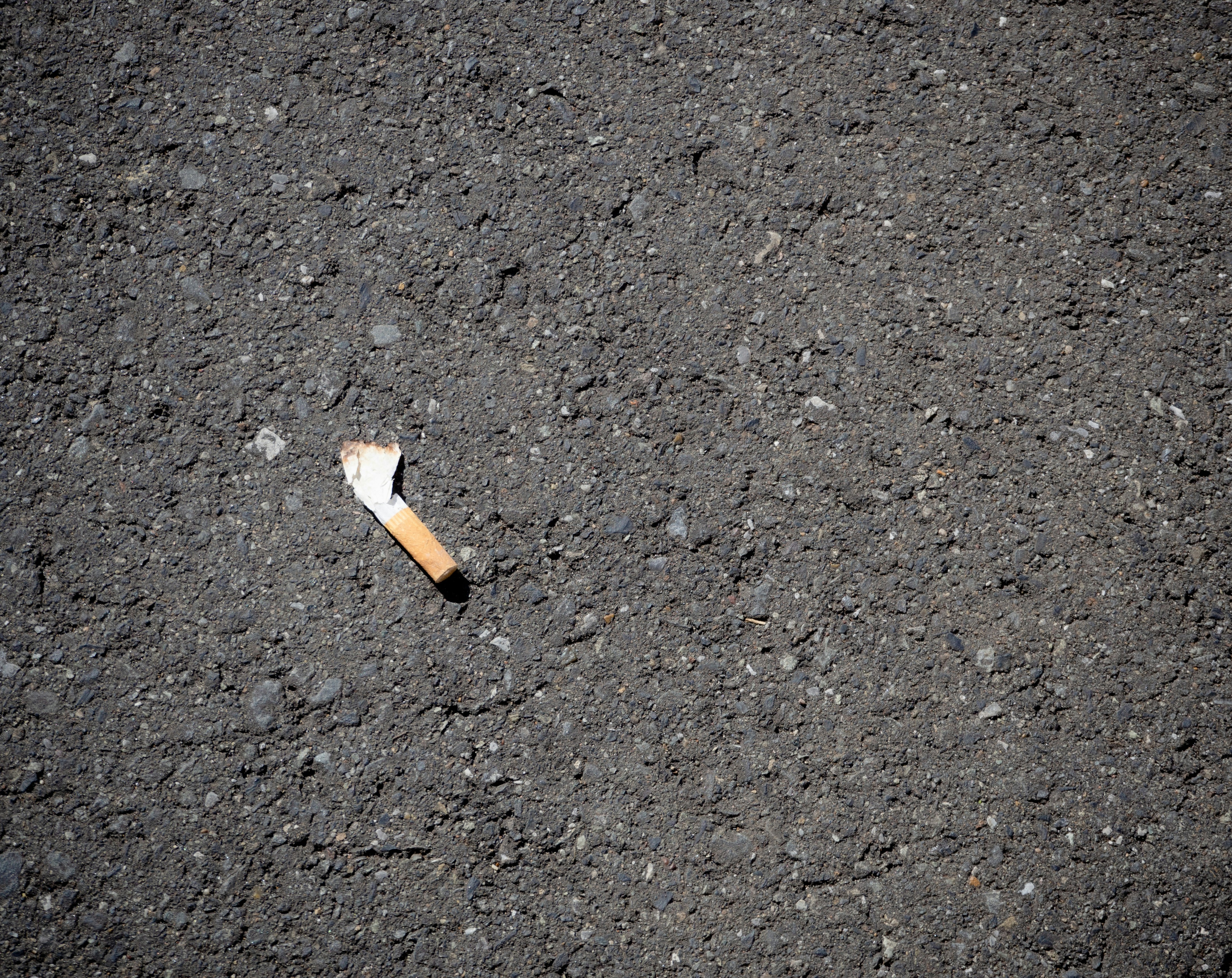 a cigarette on the ground