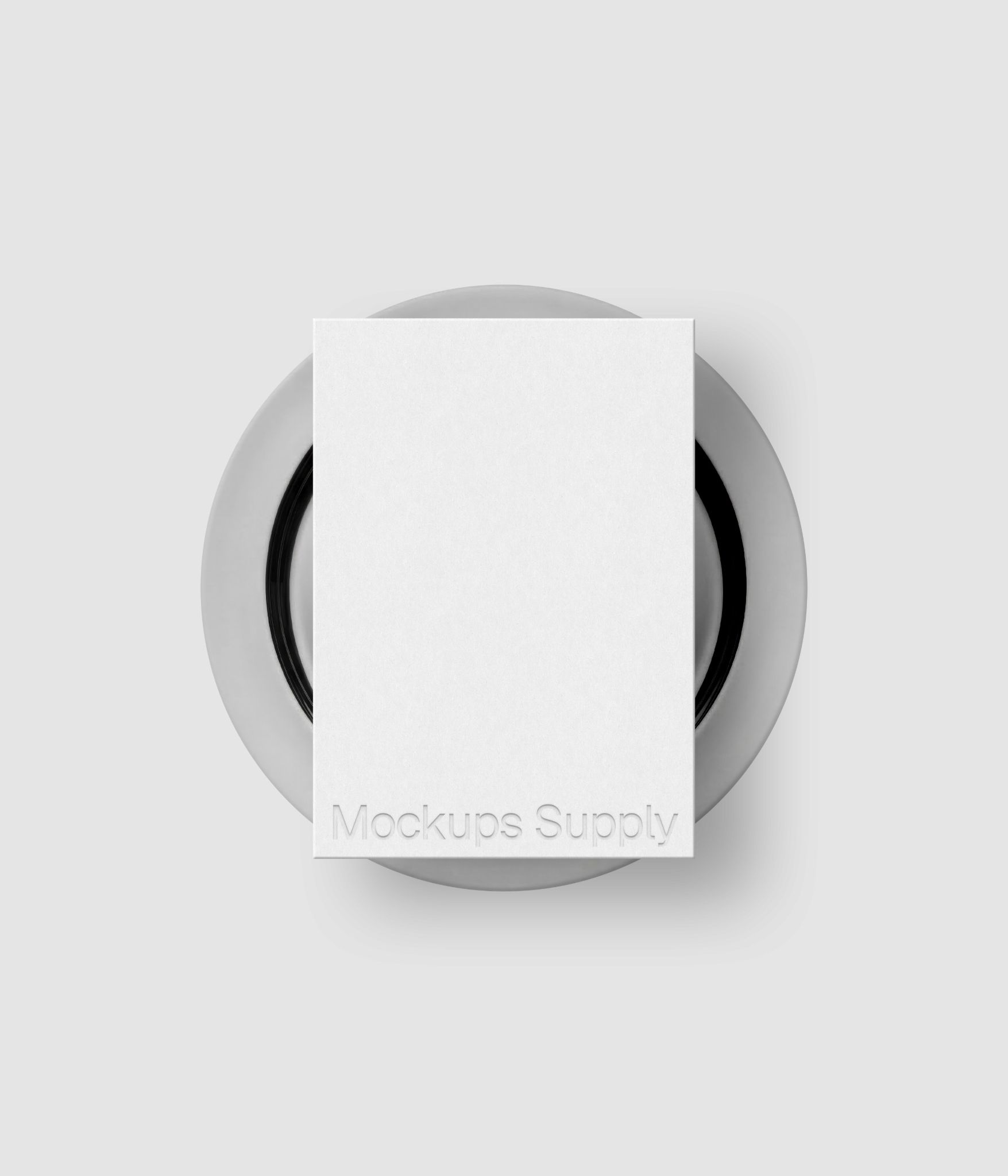 Realistic A5 menu mockup placed on metallic plate with subtle debossed branding detail