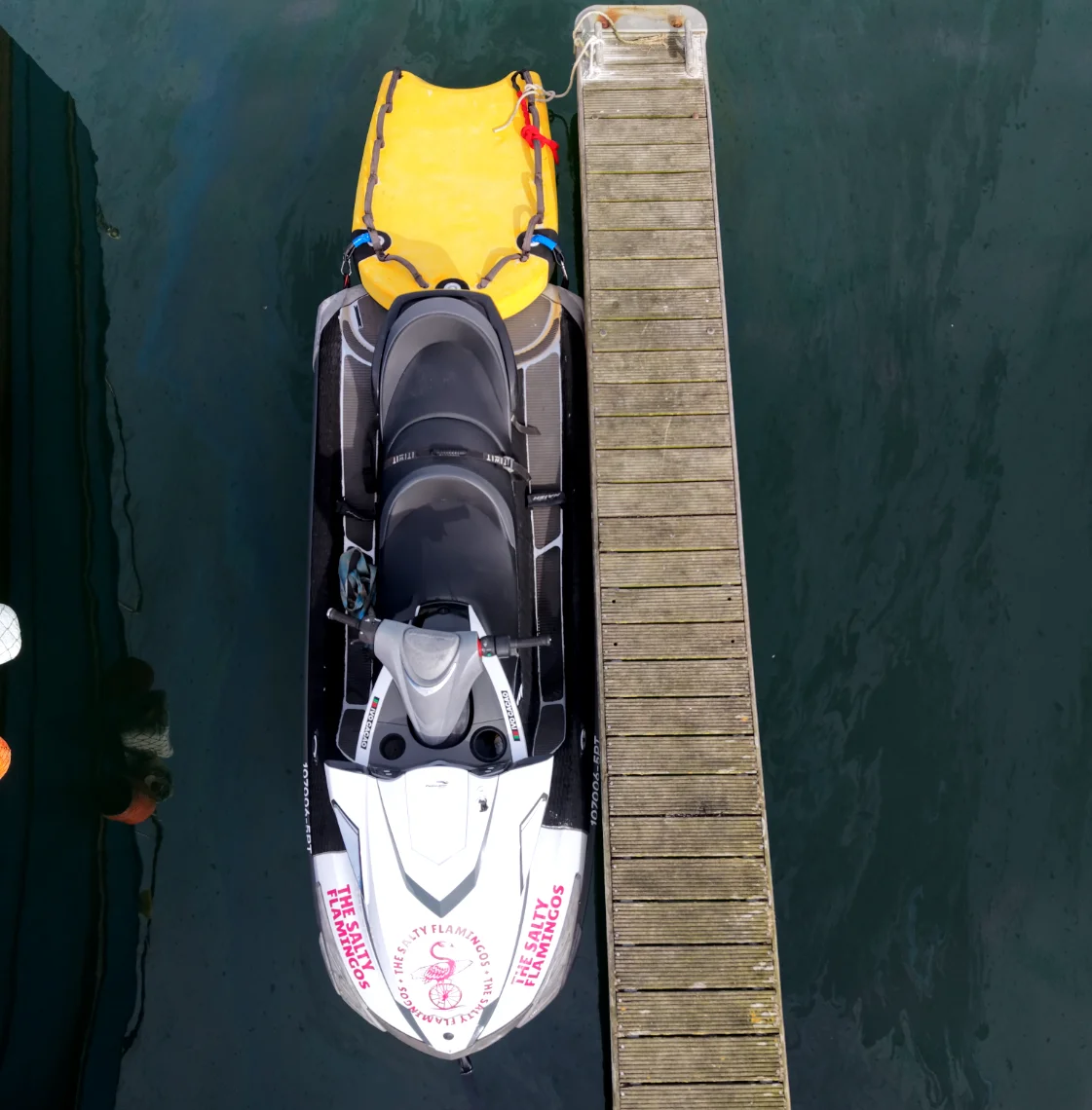 a prepared jet ski attached at a dock