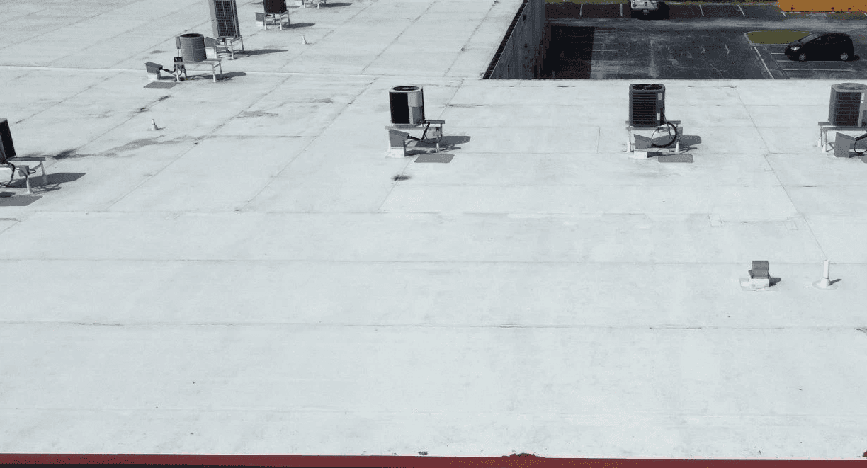 the roof of a building with a lot of solar panels on it