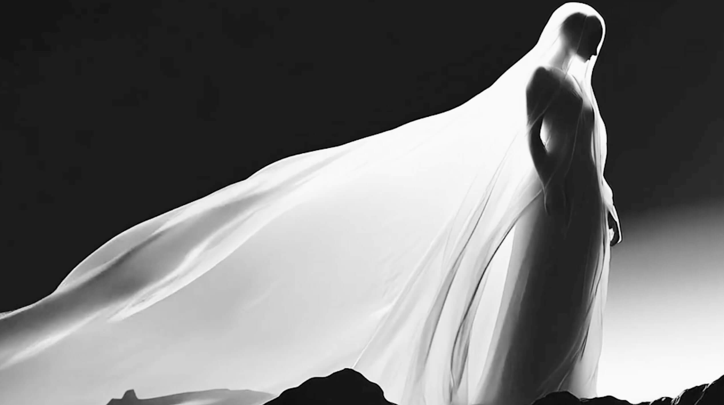 a man holding a cocktail