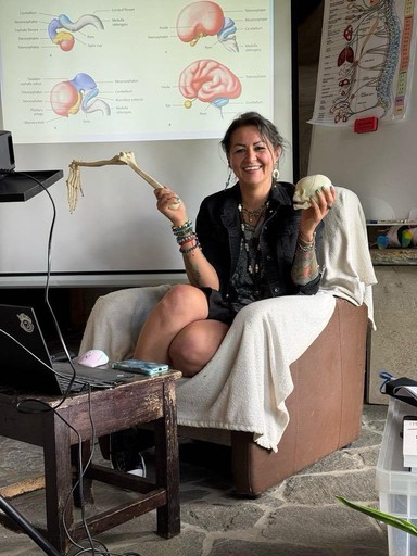 A happy person smiling to the camera.